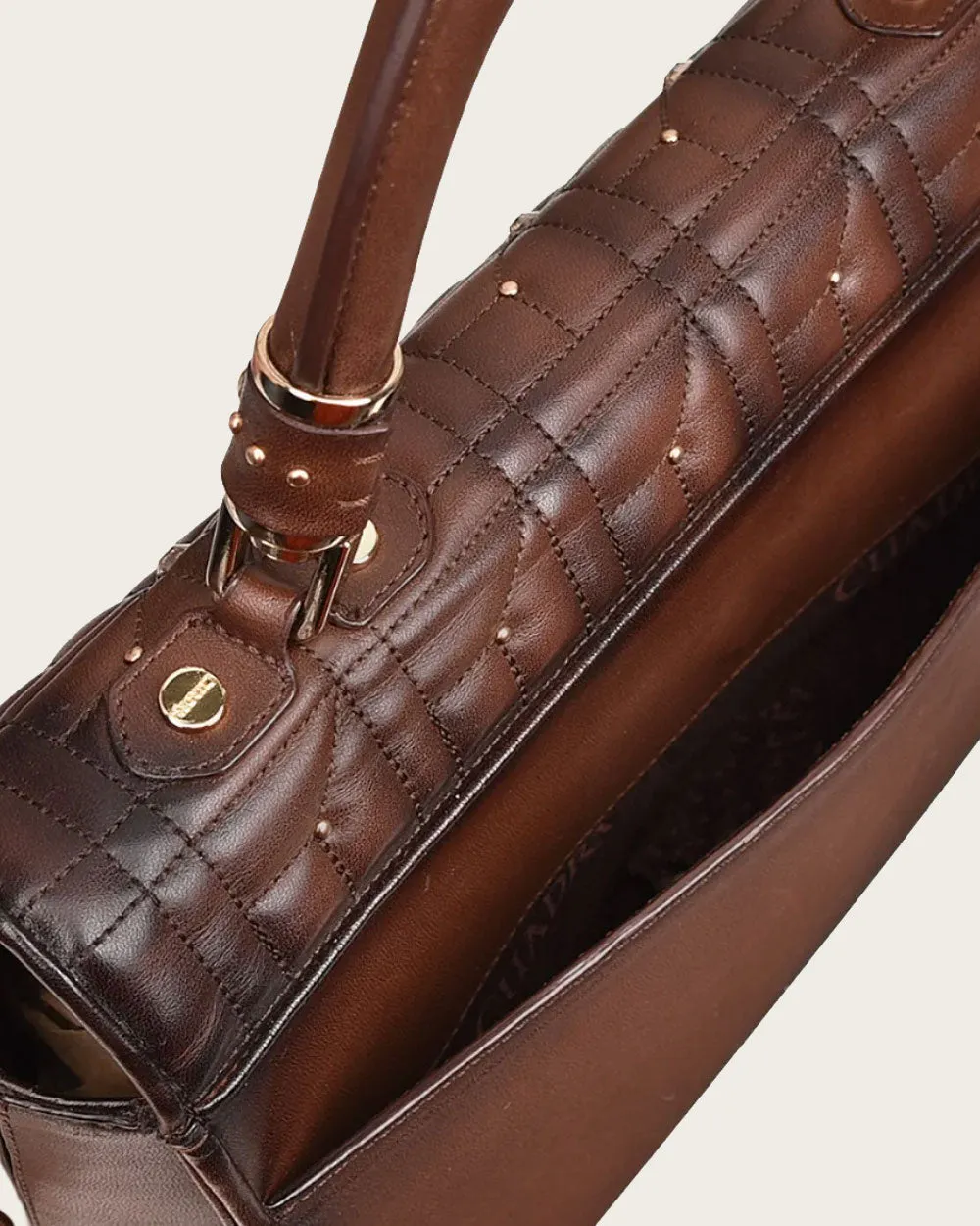 Honey brown top handle handbag